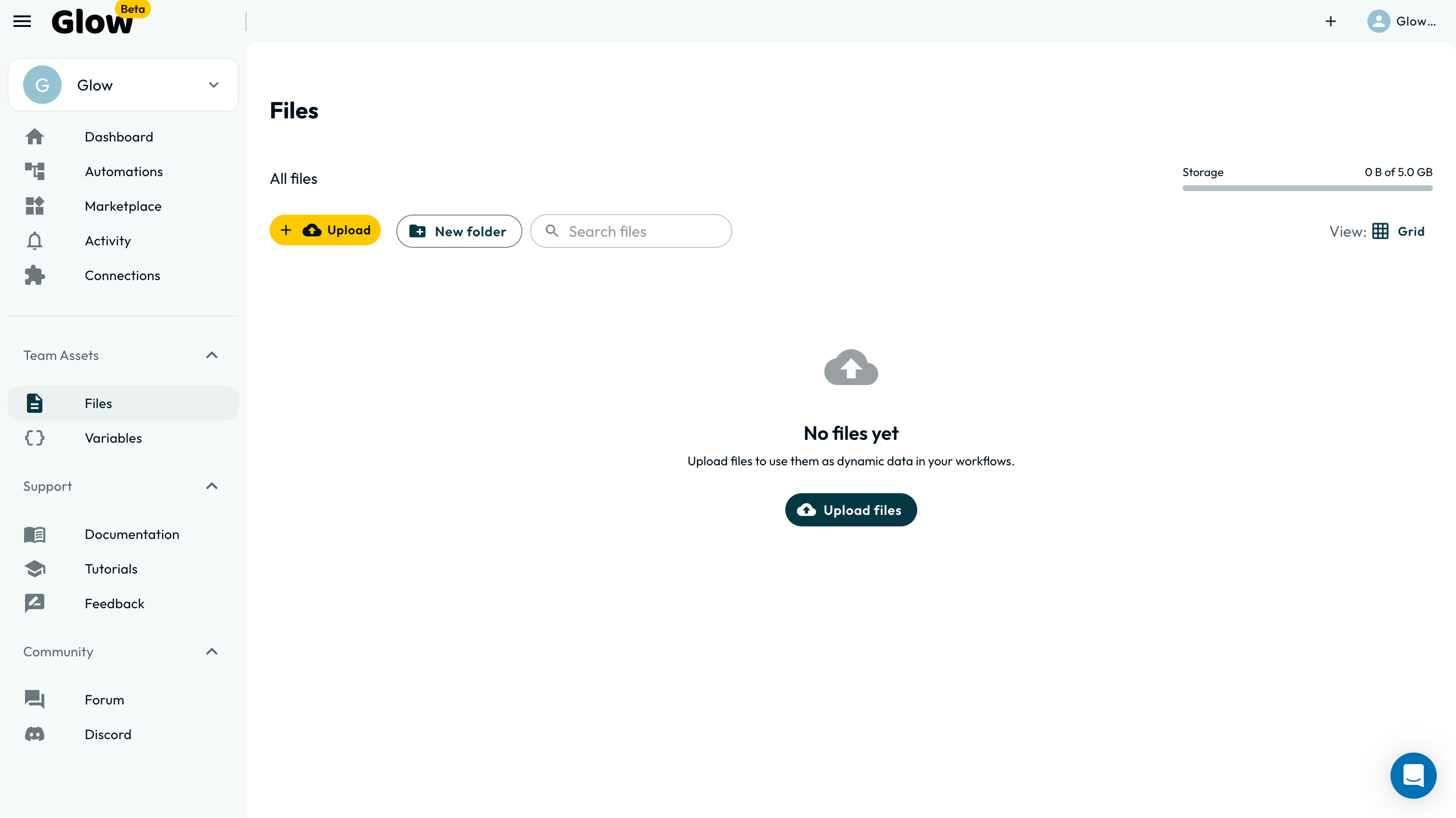 The Files tab showing an All files heading, a storage meter reading how much of the team's quota is used, Upload and New folder buttons, a grid or list view switch, and an empty state inviting you to upload files to use as dynamic data in workflows.
